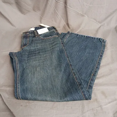 HOLLISTER LOW RISE BAGGY JEANS IN ANTIQUE BLUE DENIM SIZE W27 LONG