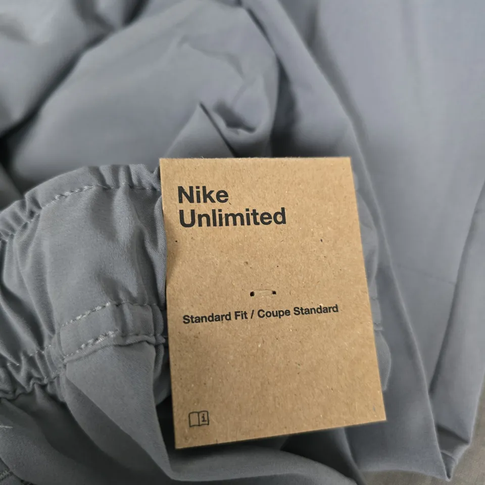 NIKE UNLIMITED DRI-FIT TRAINING TROUSERS – LIGHT GREY, UK LARGE (L)