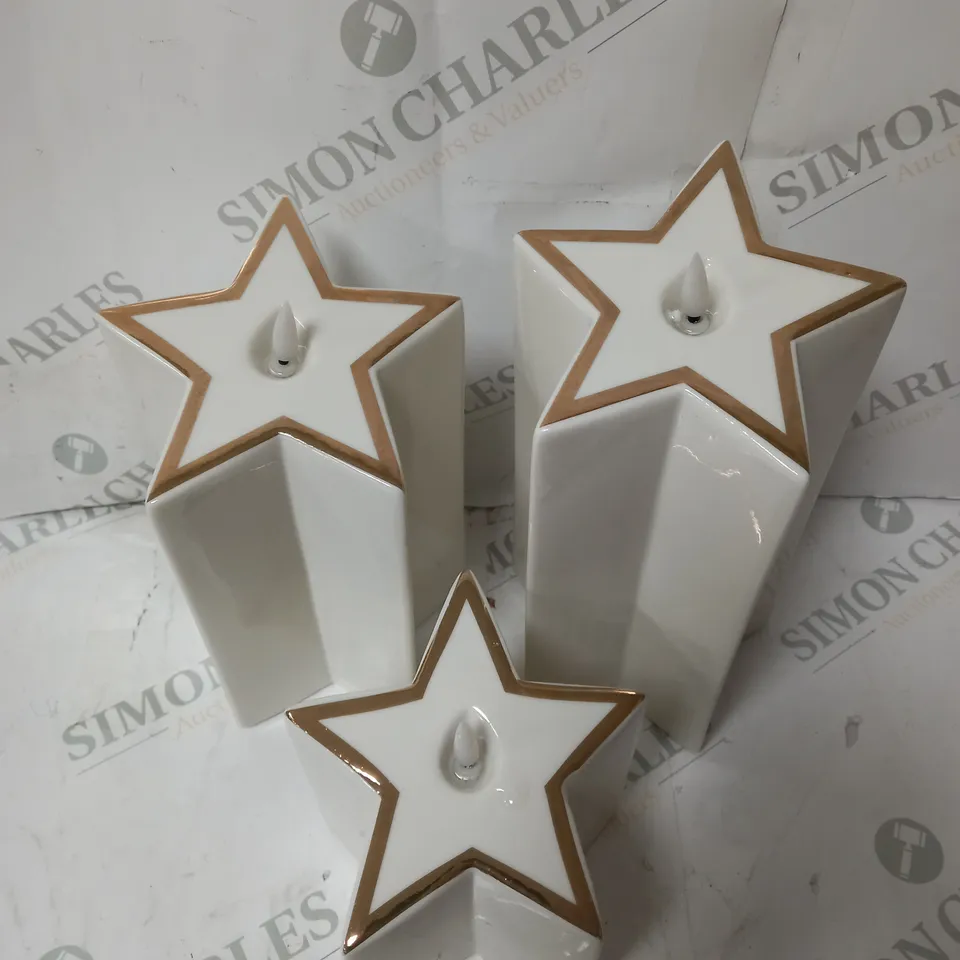 SET OF 3 PRE-LIT WHITE STAR CANDLES 