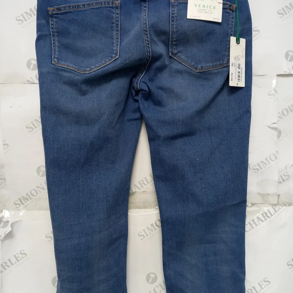 LIGHT BLUE TOMMY HILFIGER JEANS 34 X 34