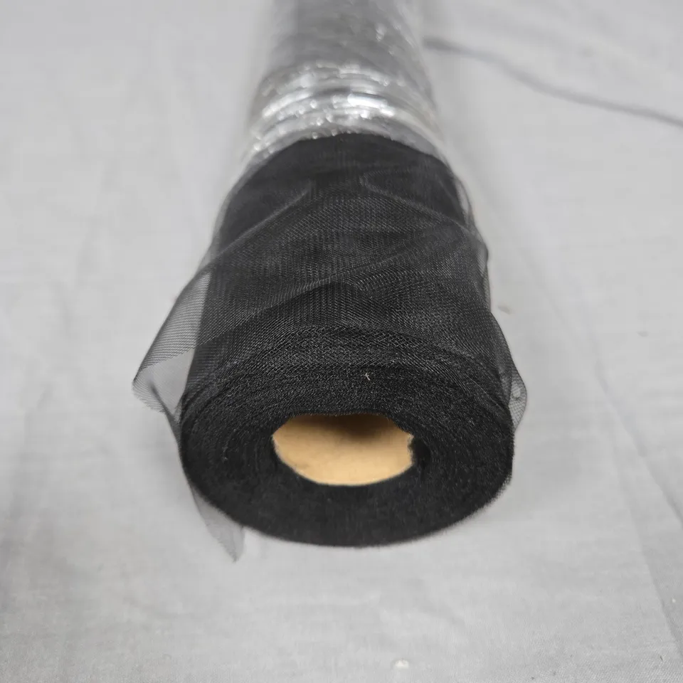 ROLL OF BLACK MESH FABRIC ON SPOOL WITH SILVER FOIL WRAP
