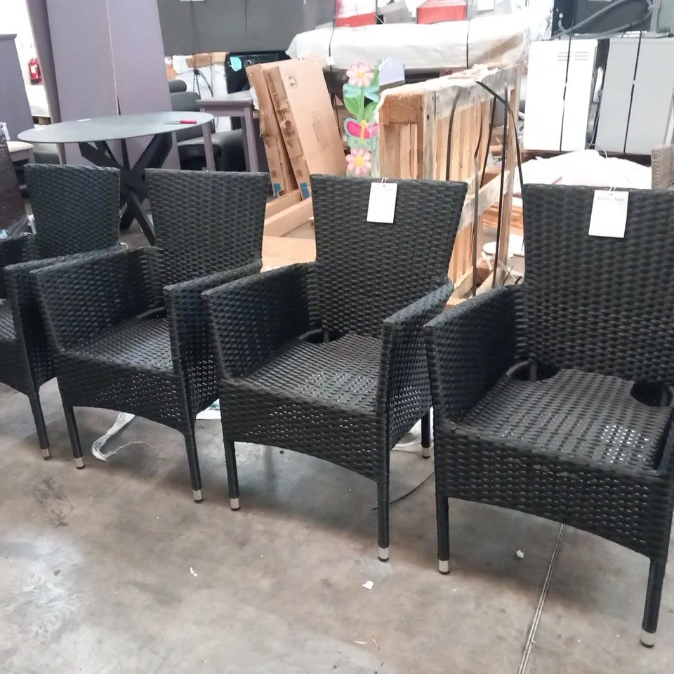 FOUR RATTAN EFFECT STACKING GARDEN CHAIRS