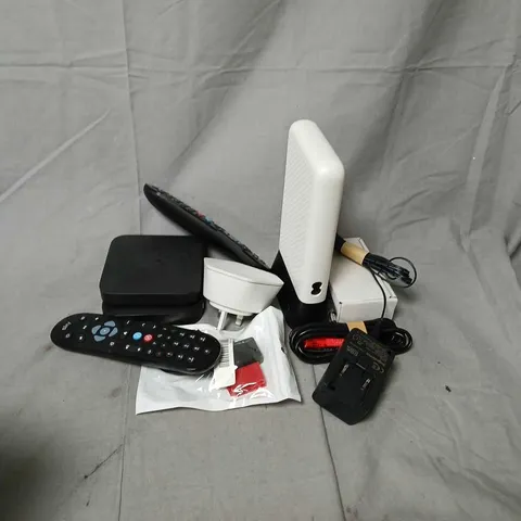 APPROXIMATELY 12 ASSORTED HOUSEHOLD ITEMS TO INCLUDE ROUTERS, CABLES, REMOTES, ETC