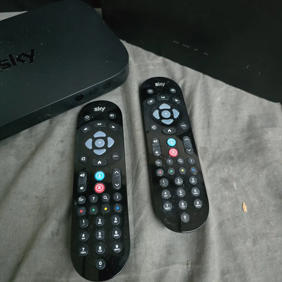SKY TV SET-TOP BOXES AND WIFI ROUTERS WITH TWO REMOTES – INCLUDES POWER ADAPTER X 3 ITEMS.
