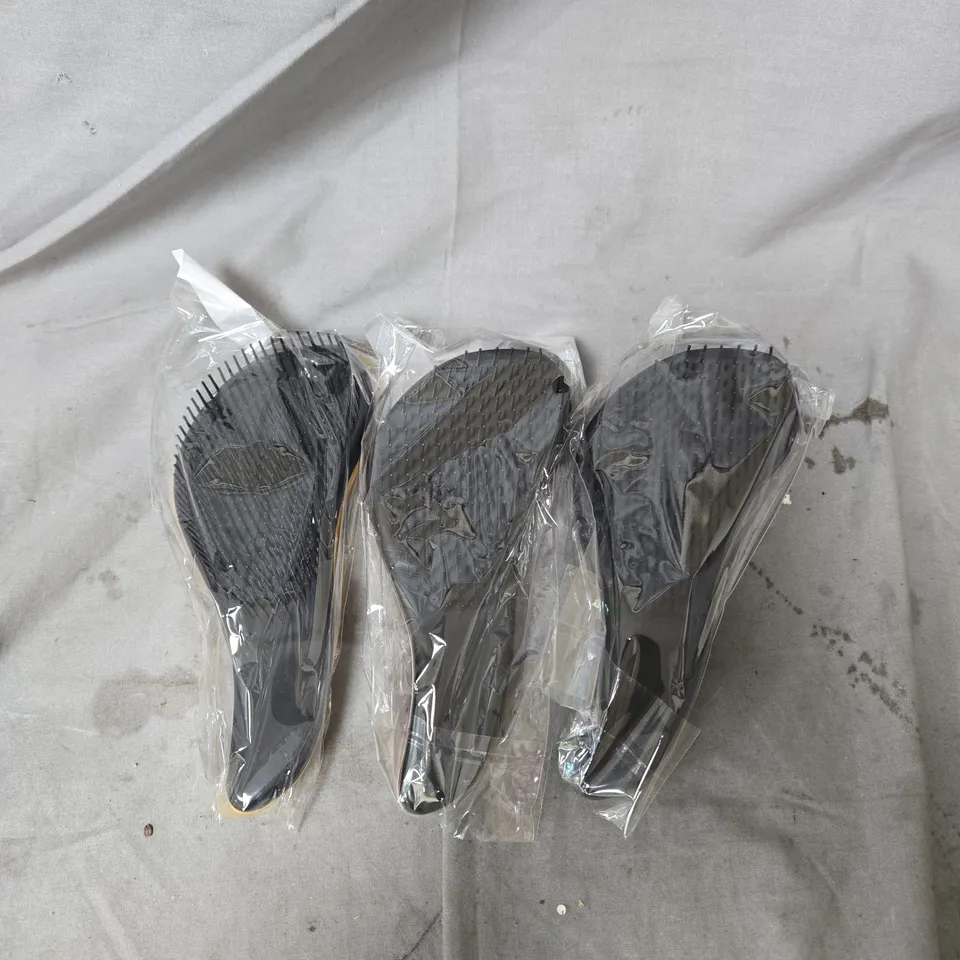 BOX OF APPROXIMATELY 50 HAIRBRUSHES IN ASSORTED COLOURS