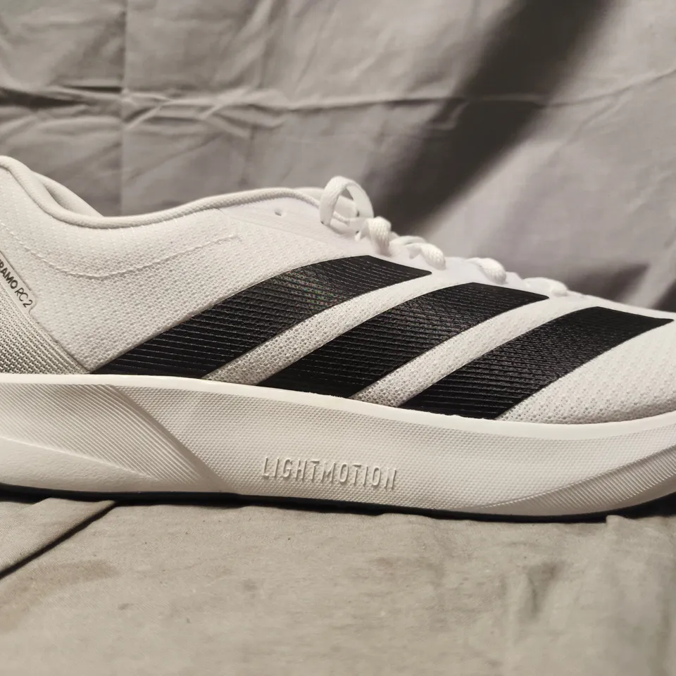 PAIR OF ADIDAS DURAMO RC2 TRAINERS IN WHITE/BLACK SIZE UK 11