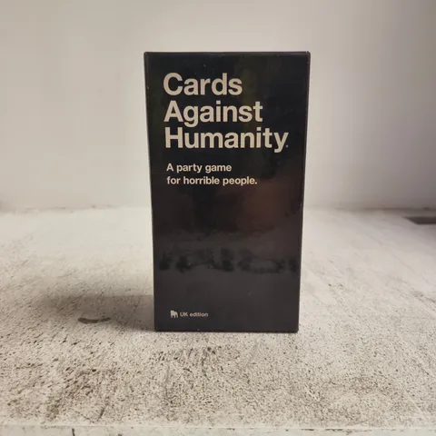 CARDS AGAINST HUMANITY – UK EDITION PARTY GAME (BOXED)