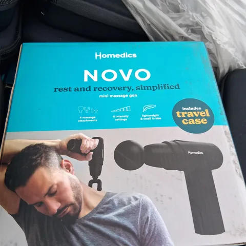 PALLET OF APPROXIMATELY 380 HOMEDICS NOVO MINI MASSAGE GUN