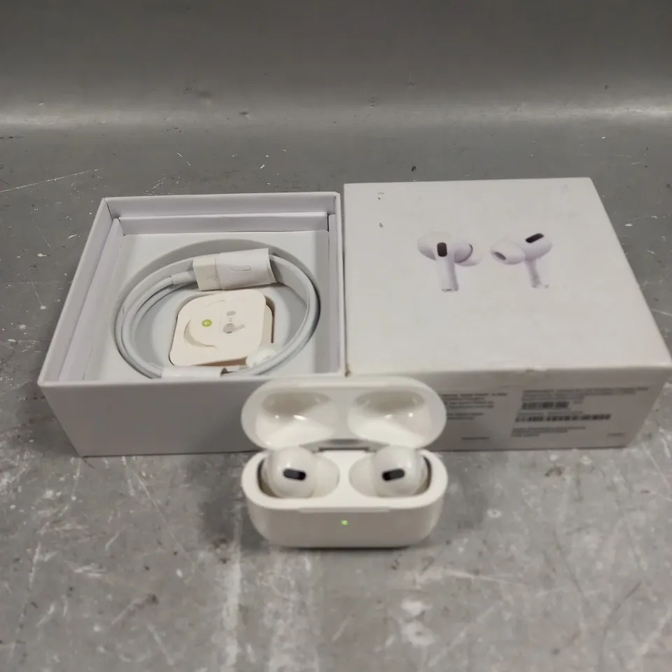 BOXED APPLE AIRPODS PRO WITH WIRELESS CHARGING CASE