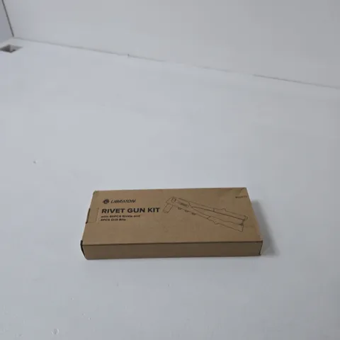 BOX OF APPROXIMATELY 12 ASSORTED HOUSEHOLD ITEMS INCLUDING RIVET GUN KIT , TIME TO SPARKLE TABLE RUNNER AND CHOPPING BOARD
