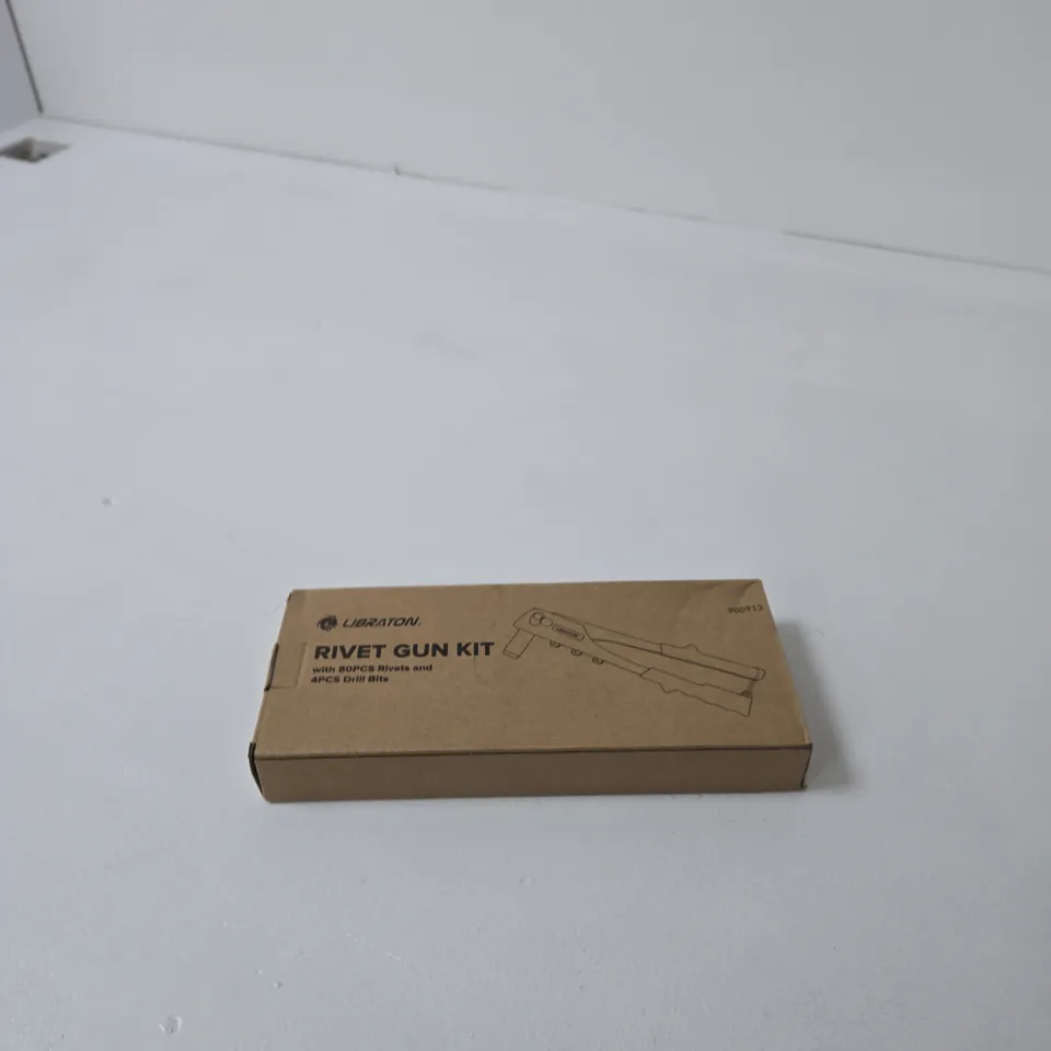BOX OF APPROXIMATELY 12 ASSORTED HOUSEHOLD ITEMS INCLUDING RIVET GUN KIT , TIME TO SPARKLE TABLE RUNNER AND CHOPPING BOARD