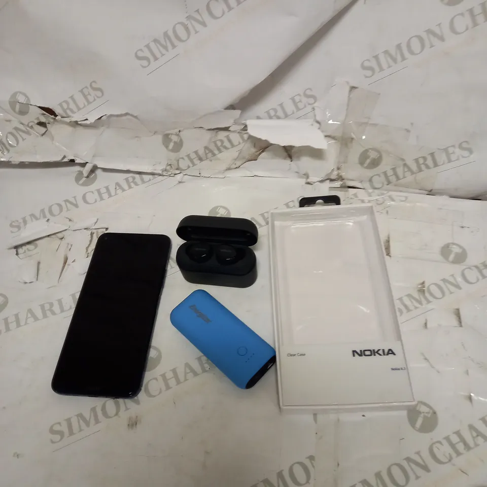 NOKIA PHONE AND EARPHONES AND ENERGZIER POWER 