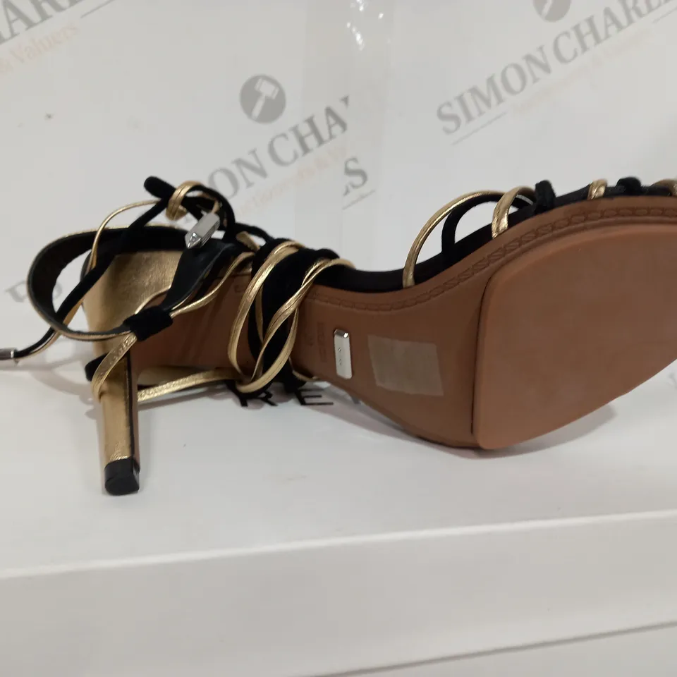 BOXED PAIR OF REISS CASSIDY STRAPPY HEELS IN BLACK/GOLD SIZE 6