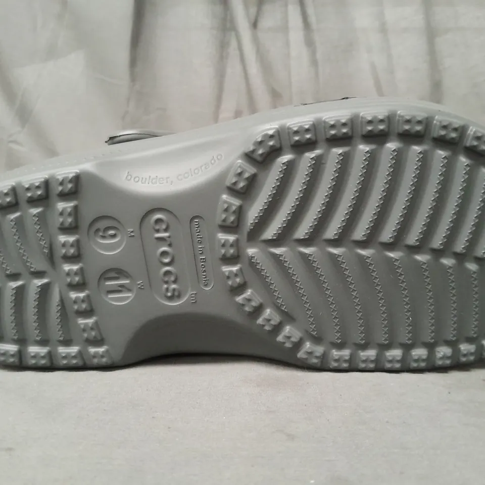 BOXED PAIR OF CROCS CLASSICS IN GREY UK SIZE M8/W9 