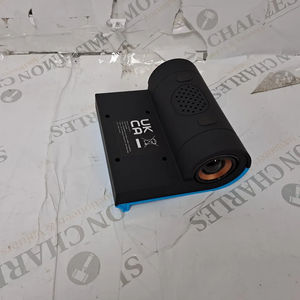 BELL HOWELL 2IN1 SPEAKER AND WIRELESS CHARGER  IN BLUE 