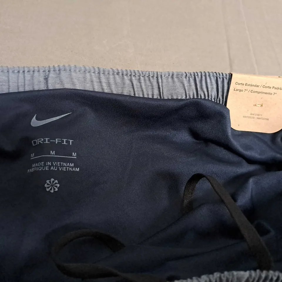 NIKE STANDARD FIT 7" FIT SHORTS IN BLUE - MEDIUM