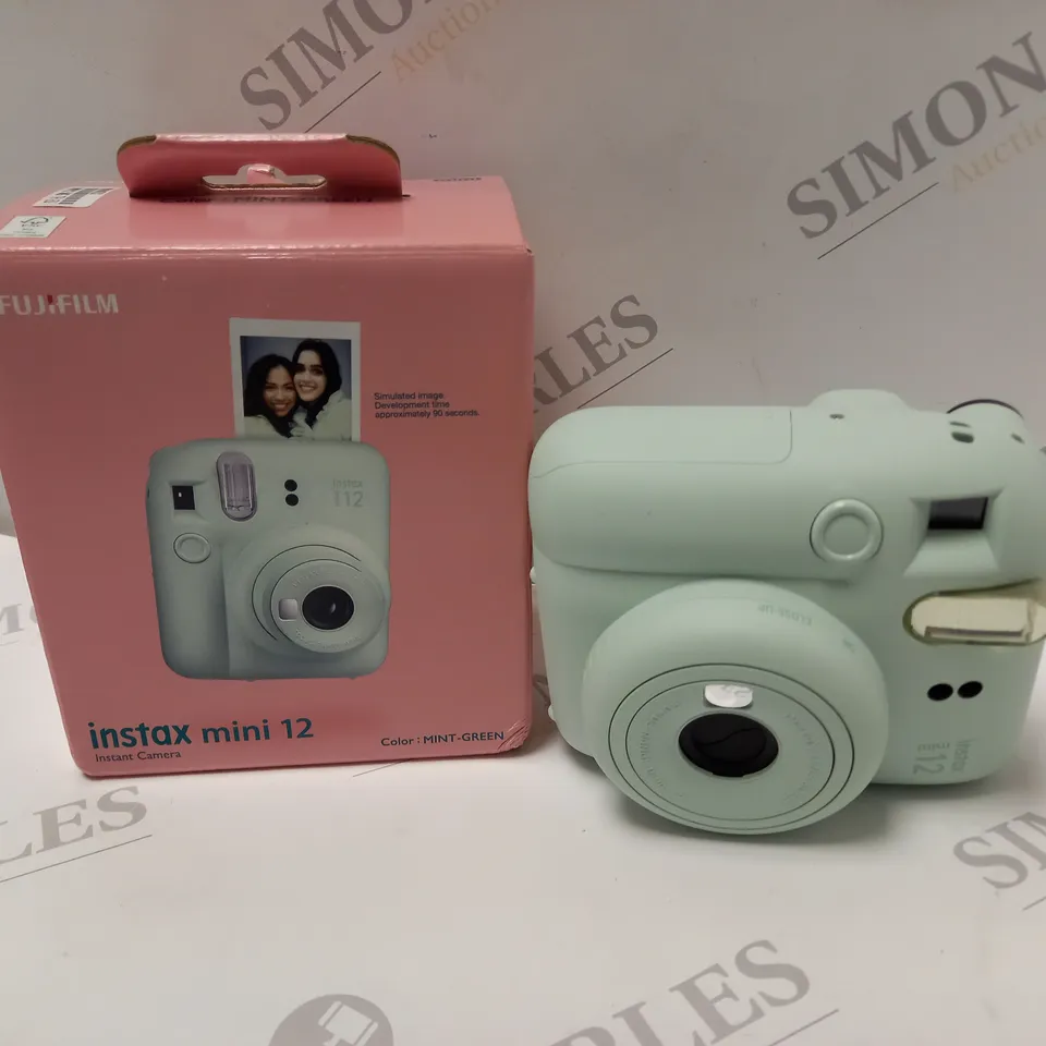 BOXED FUJIFILM INSTAX MINI 12 ISTANT CAMERA RRP £109.99