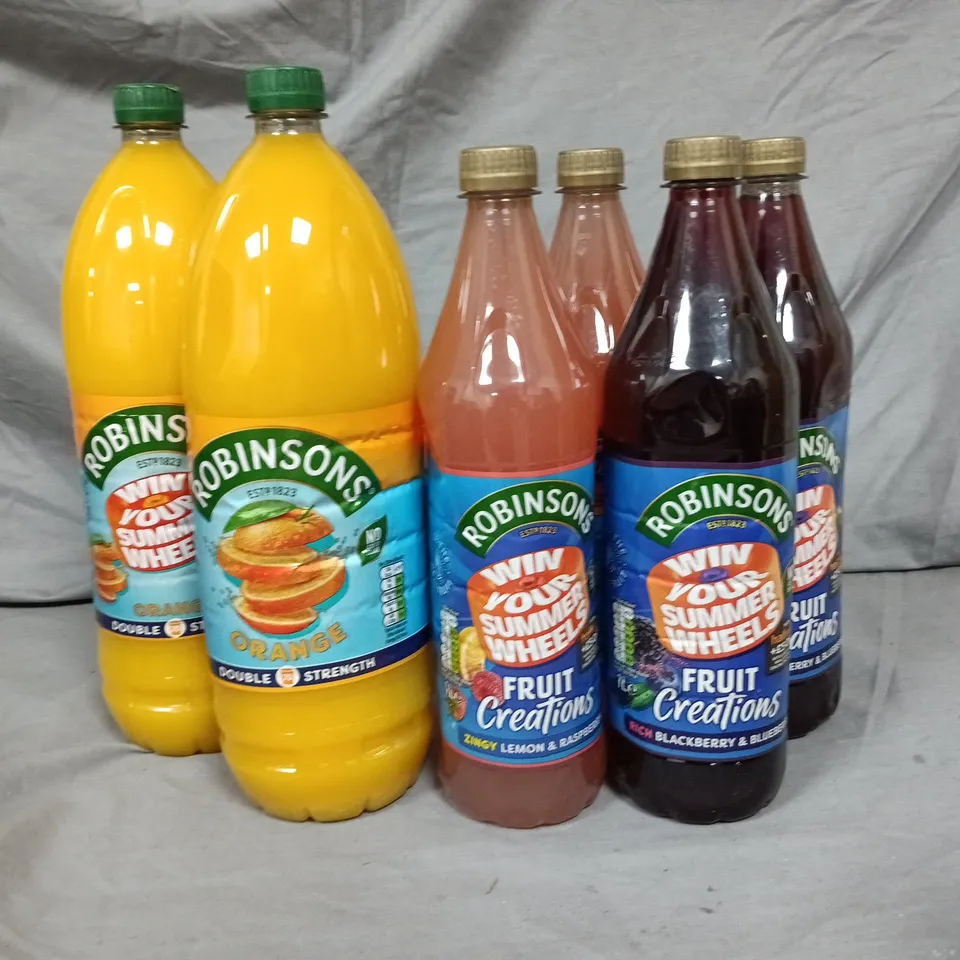 LOT OF 10 BOTTLES OF ROBINSON JUICE INCLUDES ORANGE, LEMON AND BLACKBERRY