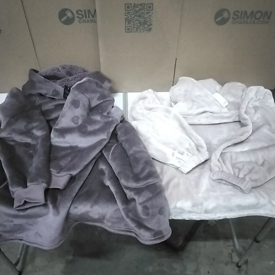 A PALLET TO CONTAIN APPROXIMATELY 60 WOMENS DESIGNER CLOTHES WHICH INCLUDE; PRETTY SECRETS OVERSIZED HOODIES ETC