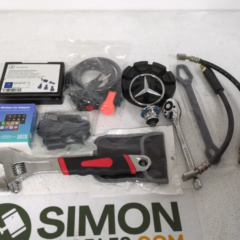 LOT OF APPROXIMATELY 22 ASSORTED SUTO AND TOOL ITEMS TO INCLUDE WIRELESS CAR ADAPTER, MERCEDES BENZ WHEEL LOCKS AND ADJUSTABLE WRENCH