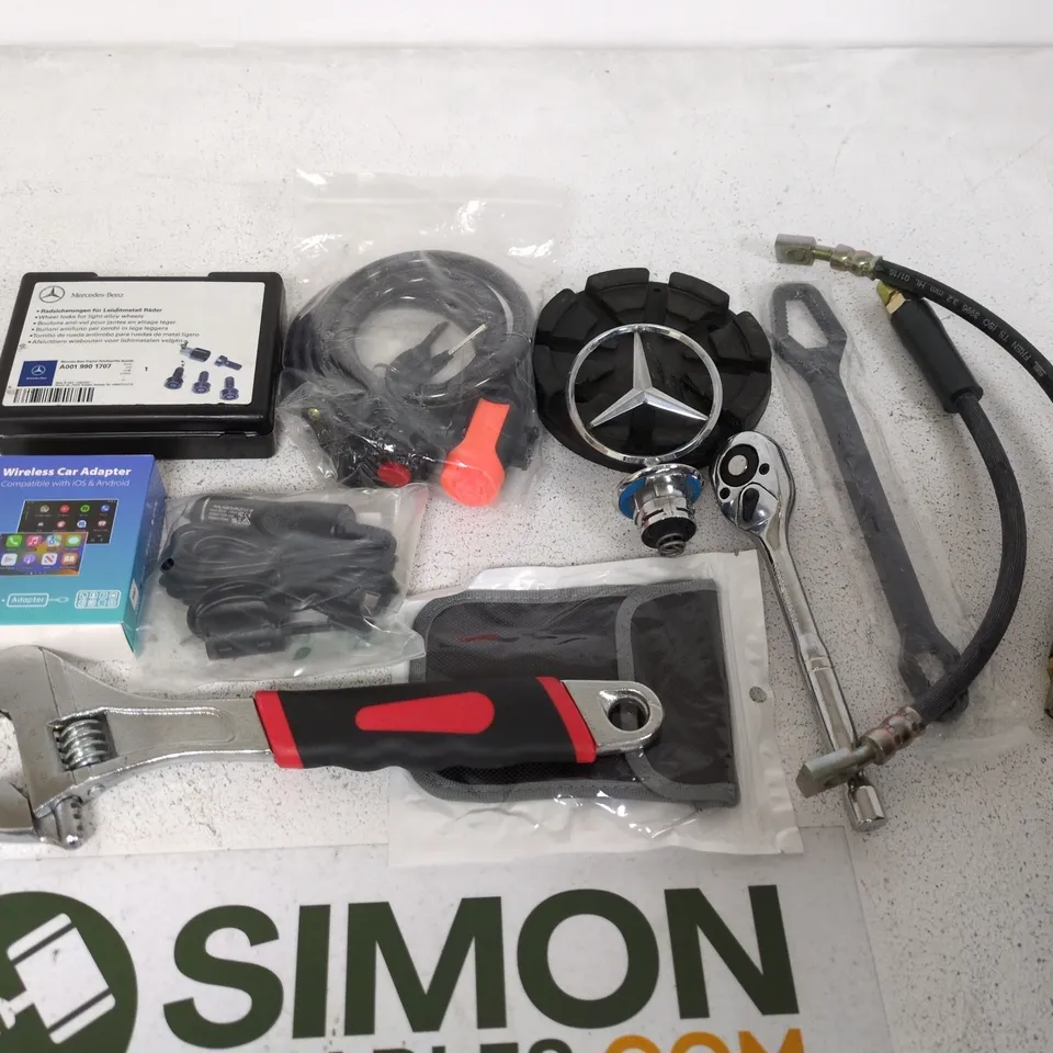 LOT OF APPROXIMATELY 22 ASSORTED SUTO AND TOOL ITEMS TO INCLUDE WIRELESS CAR ADAPTER, MERCEDES BENZ WHEEL LOCKS AND ADJUSTABLE WRENCH