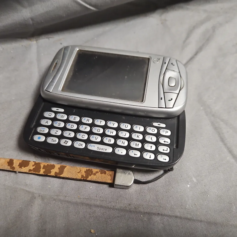 BOXED O2 XDA MINI S MOBILE PHONE