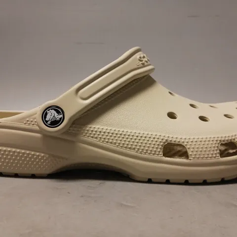PAIR OF CROCS CLOGS IN BONE UK SIZE 7