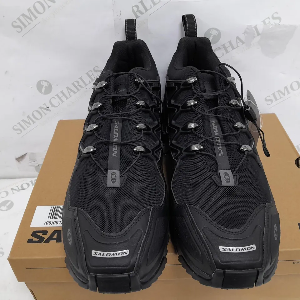 BOXED PAIR OF SALOMON OUTDOOR PLEIN AIR TRAINERS IN BLACK - UK 12.5