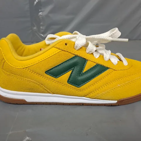 PAIR OF NEW BALANCE RC42 TRAINERS IN YELLOW - UK 6.5