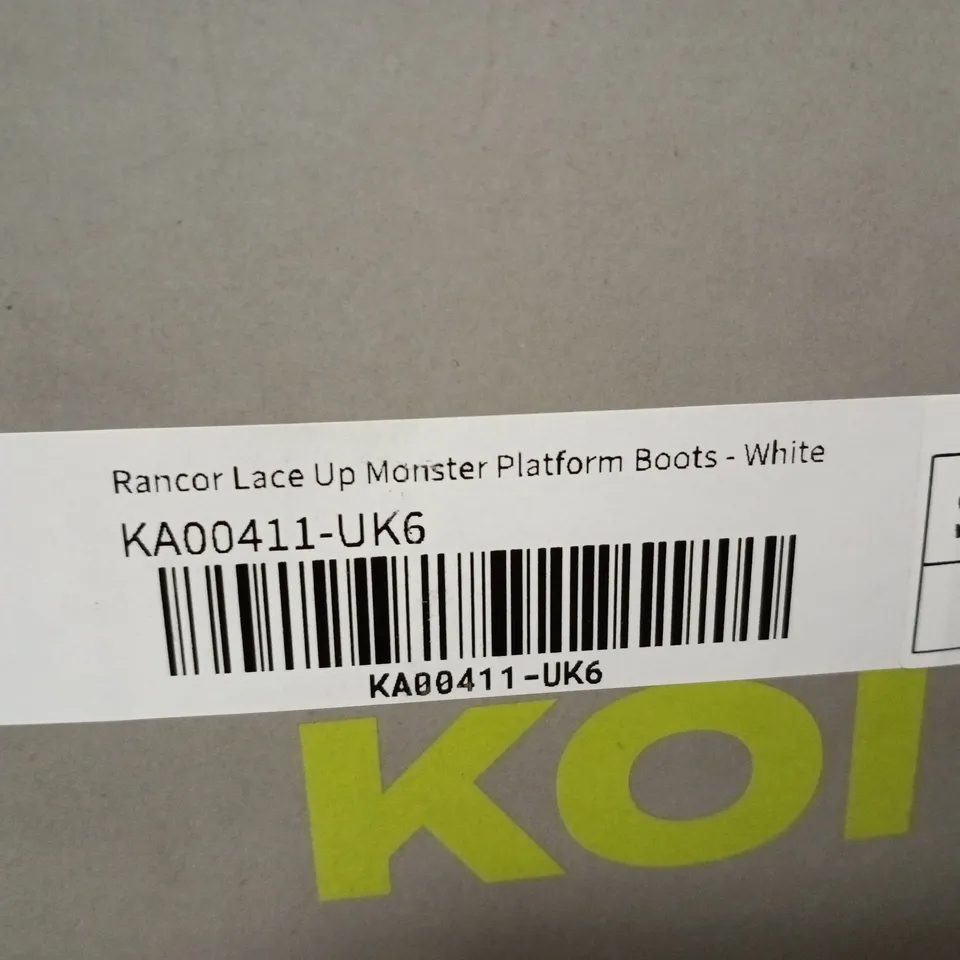 BOXED KOI RANCOR LACE UP MONSTER PLATFORM BOOTS IN WHITE, UK6