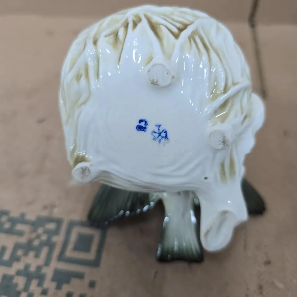 STAMPED PORCELAIN BIRD FIGURINE