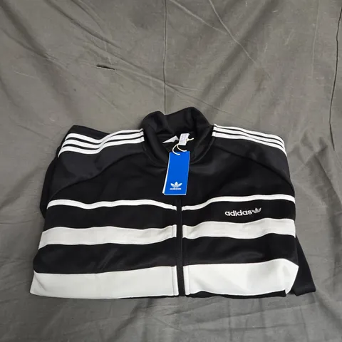 ADIDAS THE FIRST TRACK TOP IN BLACK/WHITE SIZE XL