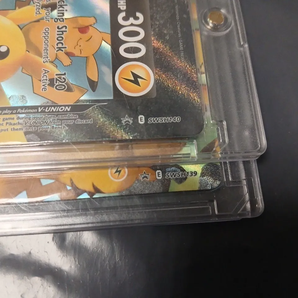 LOT OF 4 POKÉMON TRADING CARD GAME PIKACHU V-UNION CARDS IN PROTECTIVE CASES (SWSH139-142)