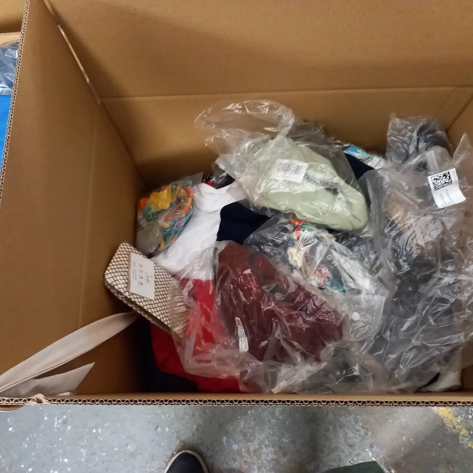 BOX OF ASSORTED CLOTHING ITEMS TO INCLUDE A PAIR OF GREY JOGGING PANTS AND A LONG SLEEVE EXTREME T SHIRT