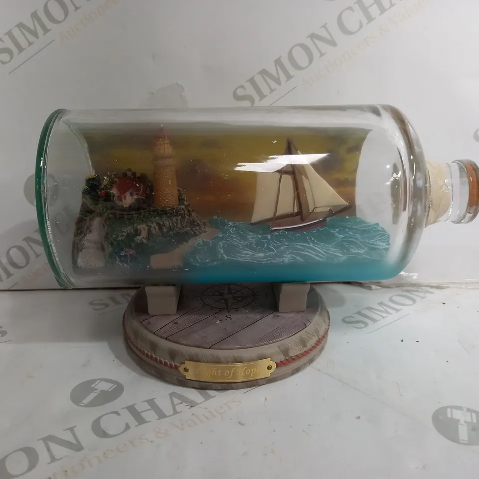 HAWTHORNE VILLAGE LIGHT OF HOPE GLASS BOTTLE - COLLECTION ONLY