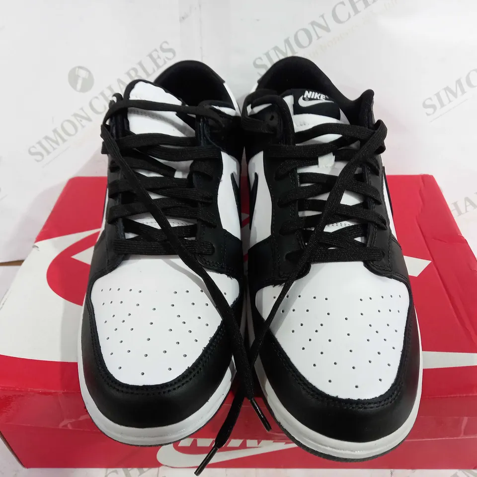 BOXED PAIR OF NIKE DUNK LOW RETRO BLACK/WHITE - UK 12