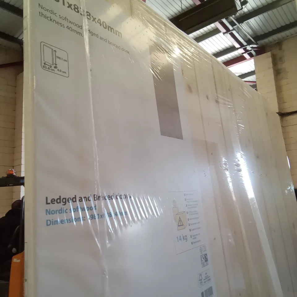 PACKAGED 1981 X 838 X 40M NORDNIC SOFTWOOD EDGED AND BRACED DOOR 