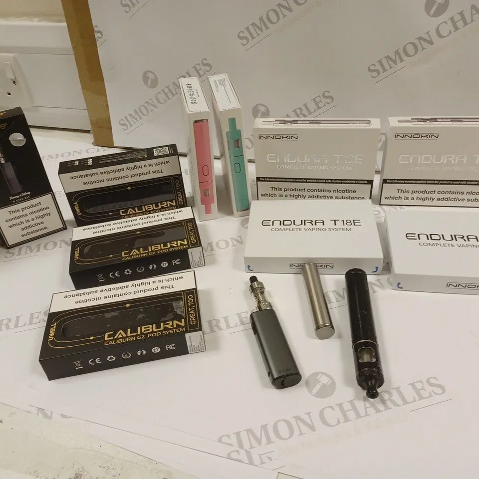 box of approximately 35 assorted e-cigarettes
