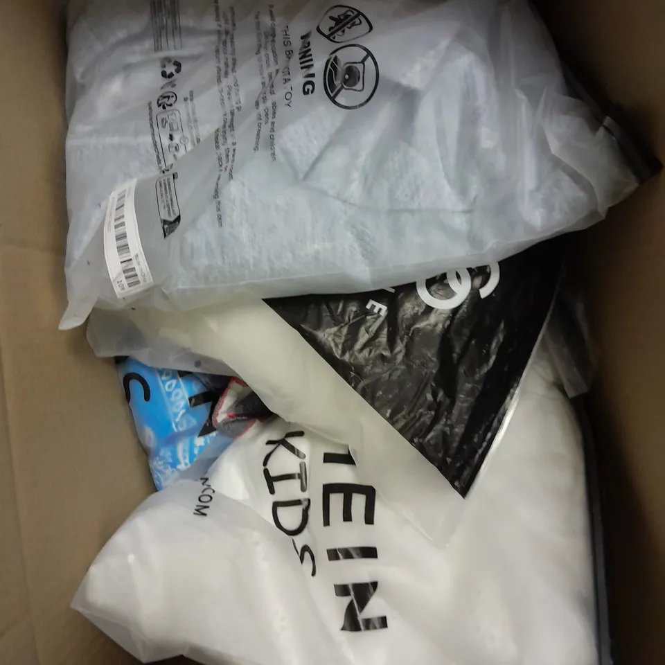 APPROXIMATELY 12 ASSORTED CHILDRENS CLOTHING RANGING FROM 10-15 YEARS PRODUCTS TO INCLUDE - T-SHIRT , PANTS , DRESS ETC