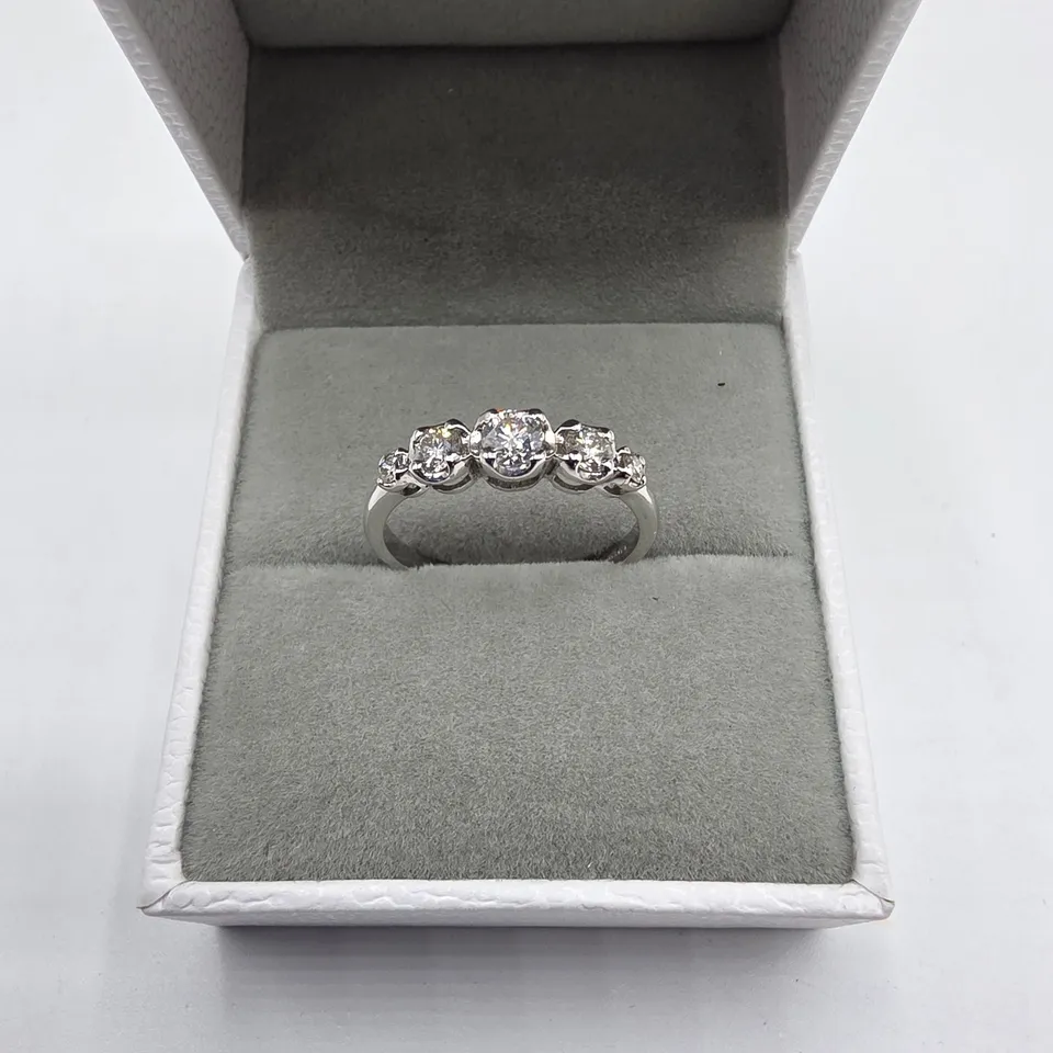 18CT WHITE GOLD FIVE STONE GRADUATED HALF ETERNITY RING SET WITH NATURAL DIAMONDS