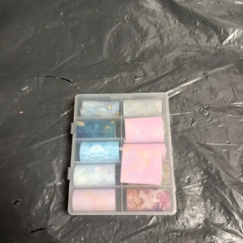 BOX OF APPROXIMATELY 25 ASSORTED NAIL FOIL ART 