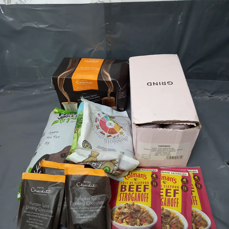APPROXIMATELY 10 ASSORTED FOOD & DRINK ITEMS TO INCLUDE - GRIND ICED BLACK COFFEE CANS - COLMAN'S BEEF STROGANOFF SEASONING - FOREST WHOLE FOODS ORGANIC RED RICE - ETC