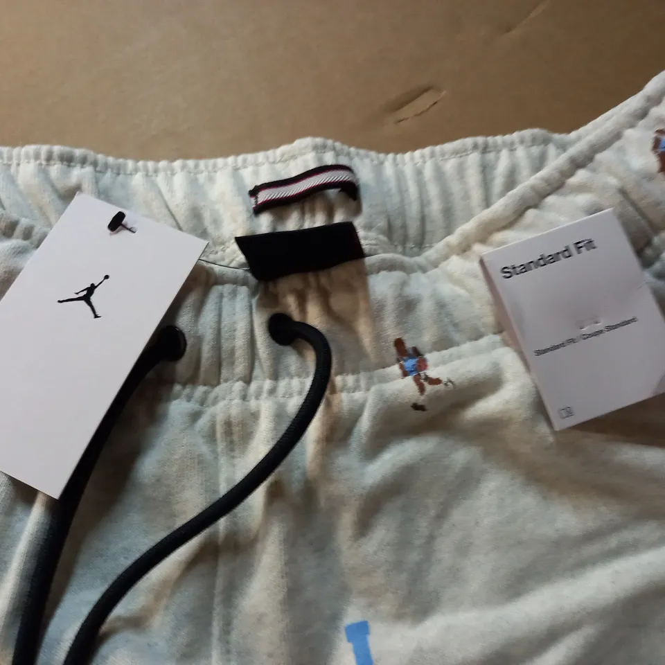 JORDAN STANDARD FIT BASKETBALL THEMED JOGGERS IN CREAM - M