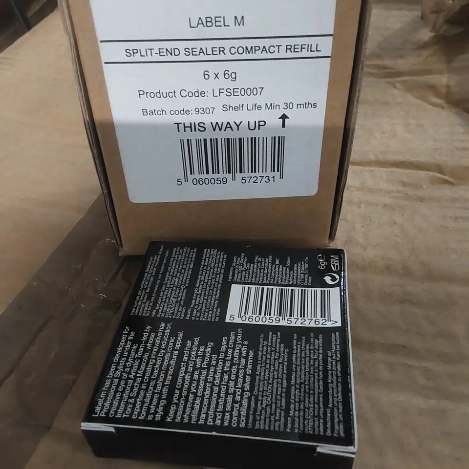 CAGE TO CONTAIN APPROX 16 X BOXES OF LABEL.M SPLIT-END SEALER COMPACT REFILLS - APPROX 120 REFILLS PER BOX // CAGE NOT INCLUDED 