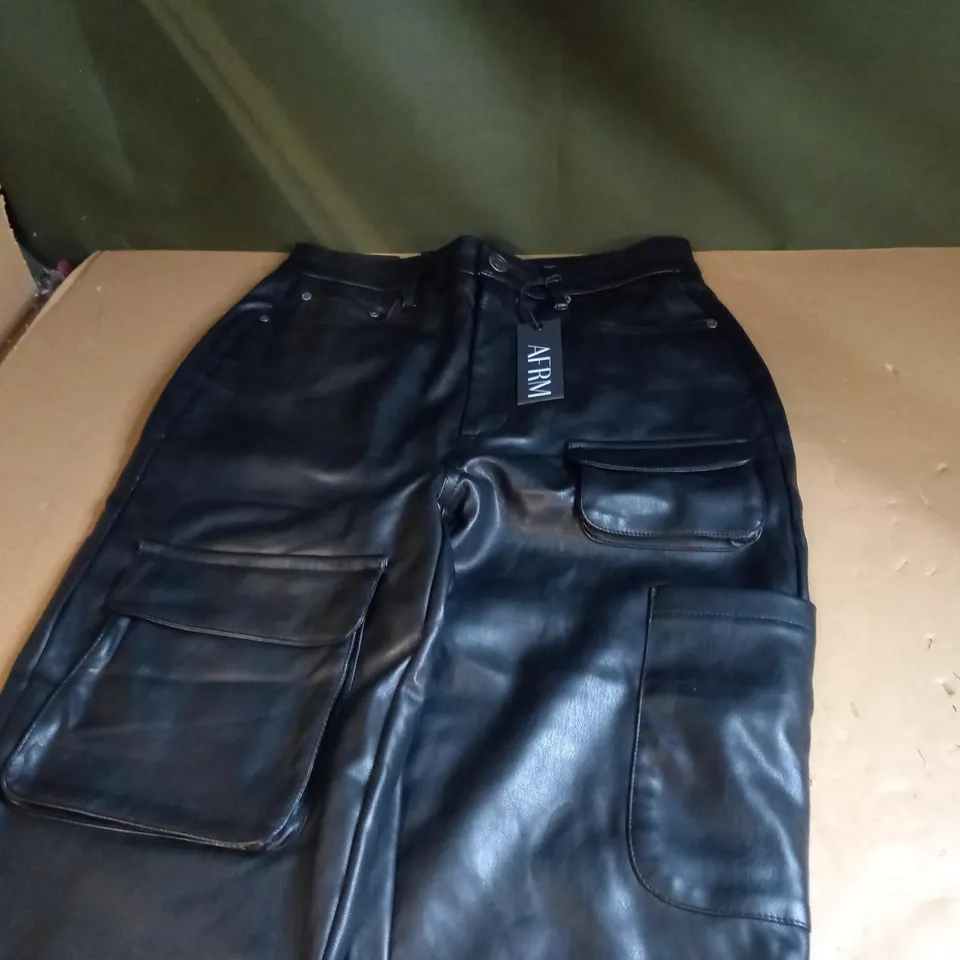 PAIR OF HIGH RISE FAUX LEATHER SKINNY CARGO TROUSERS IN BLACK SIZE 26