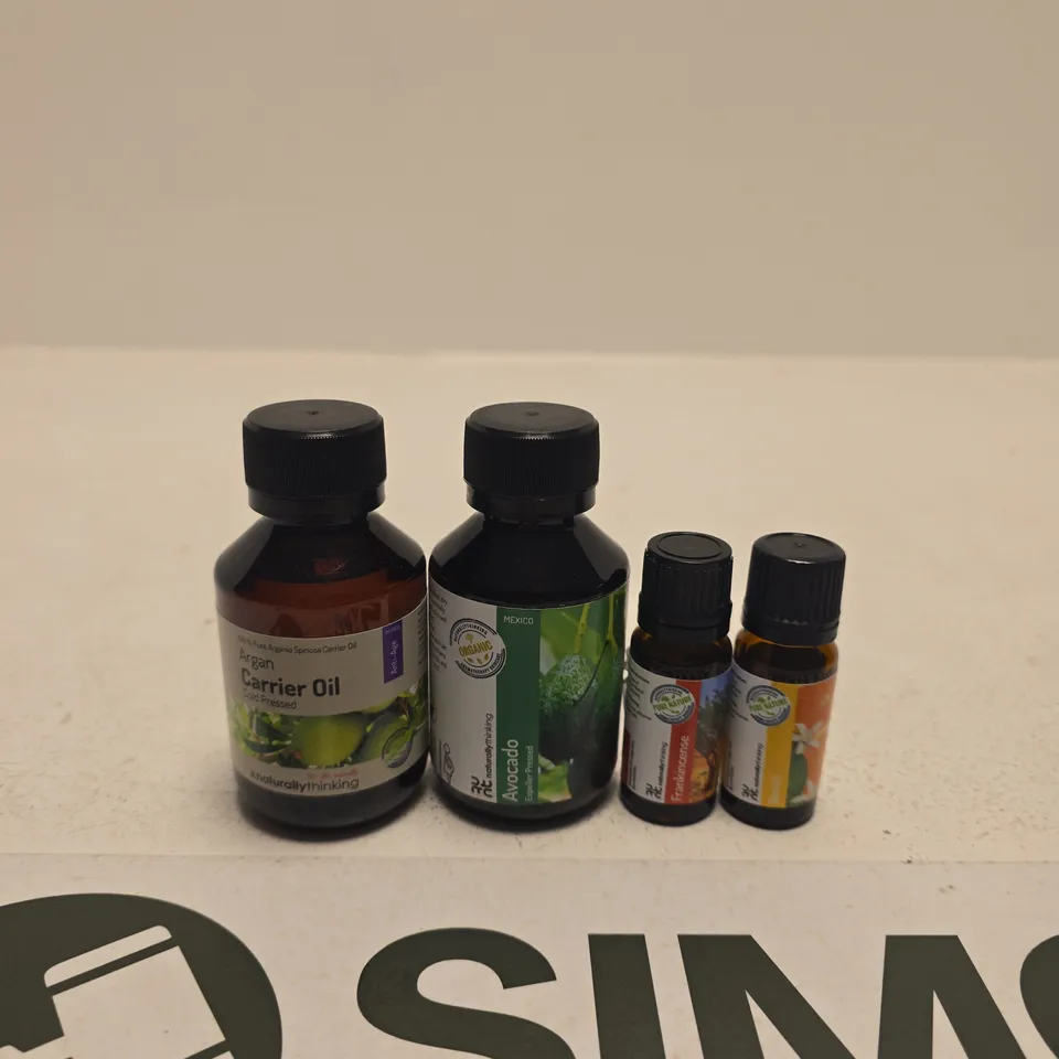 ASSORTED ESSENTIAL OIL & CARRIER OIL BOTTLES (ARGAN & AVOCADO) – 4 AMBER GLASS BOTTLES