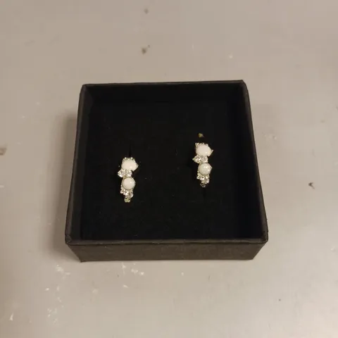 SCREAM PRETTY WHITE STONE HOOP EARRINGS