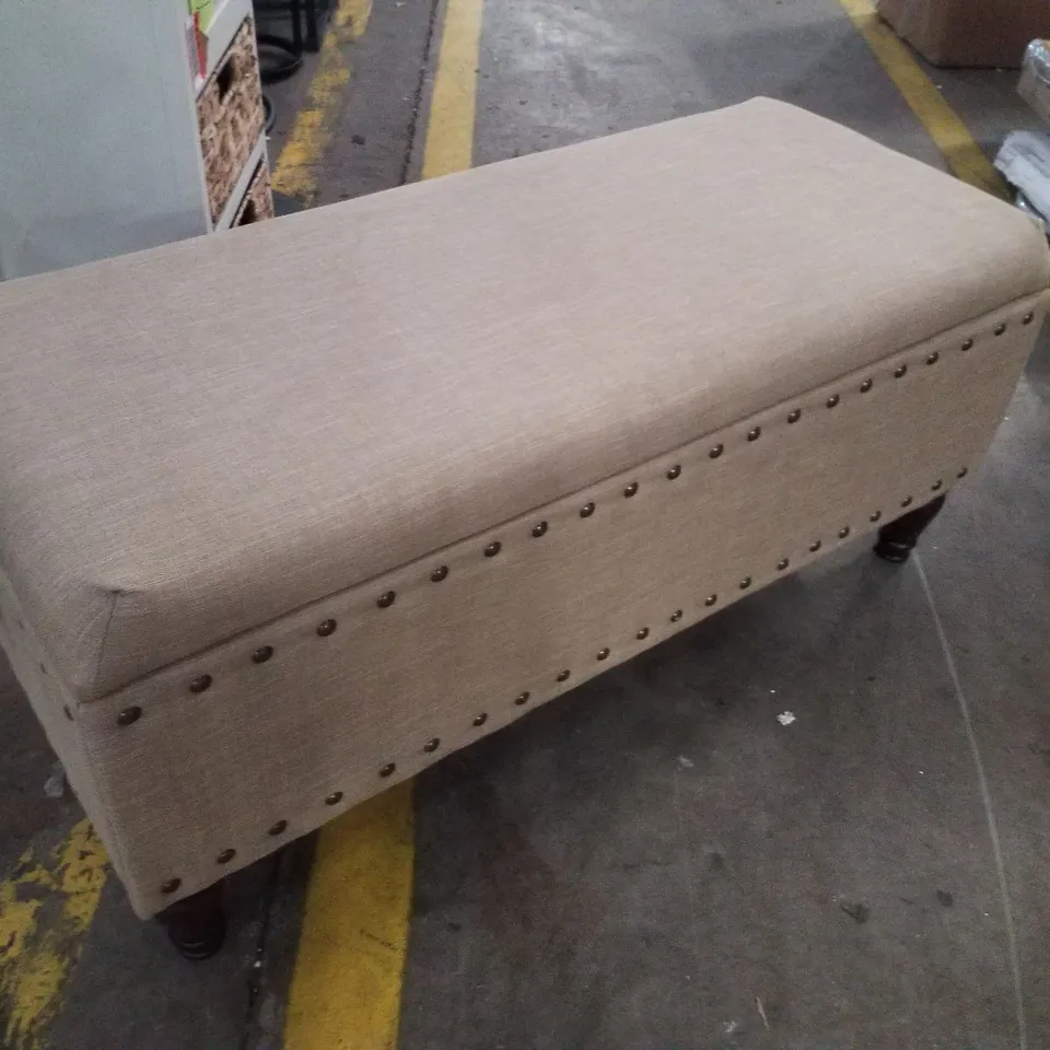 ANIELLE UPHOLSTERED OTTOMAN STORAGE BENCH - TAN/BRUSHED BRASS NAILHEAD