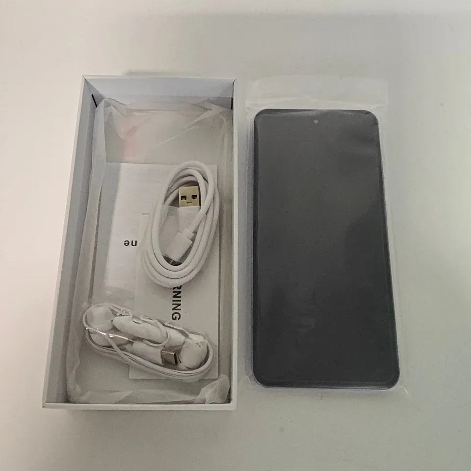 BOXED FUFFI ANDROID SMART PHONE IN PURPLE