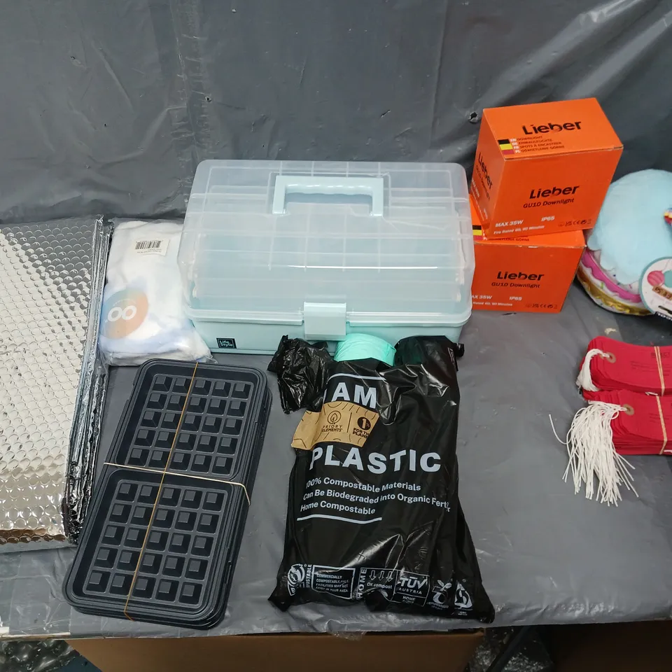 BOX OF APPROXIMATELY 15 ASSORTED ITEMS TO INCLUDE - GU10 DOWNLIGHTS, OODIE PILLOWCASE, AND PLASTIC BIODEGRADABLE BAGS ETC. 